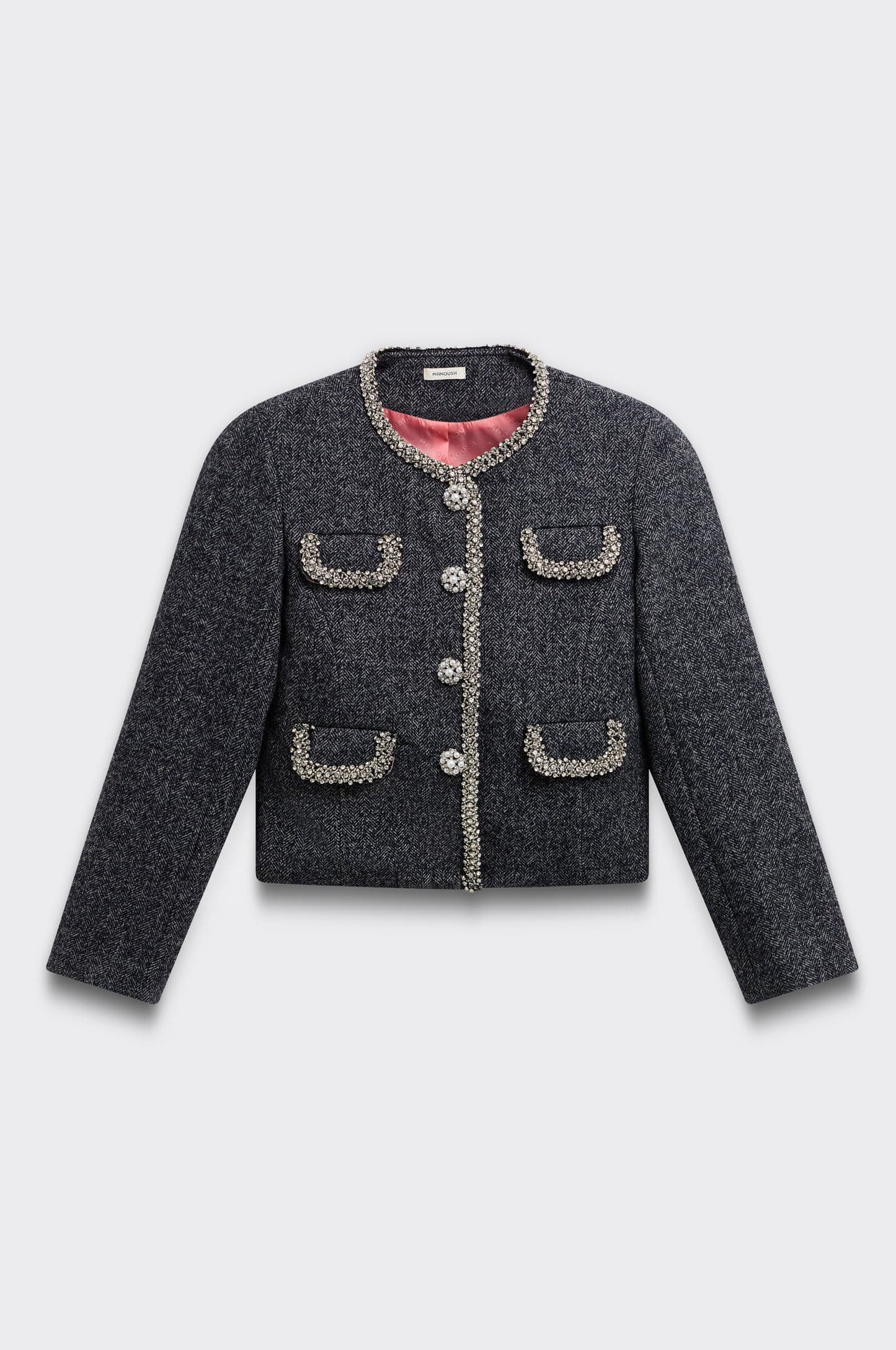 Un manteau élégant conçu pour la chaleur et une silhouette polie par temps froid.